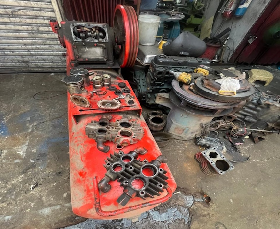 Dismantling piston compressor for servicing stainless steel pipes